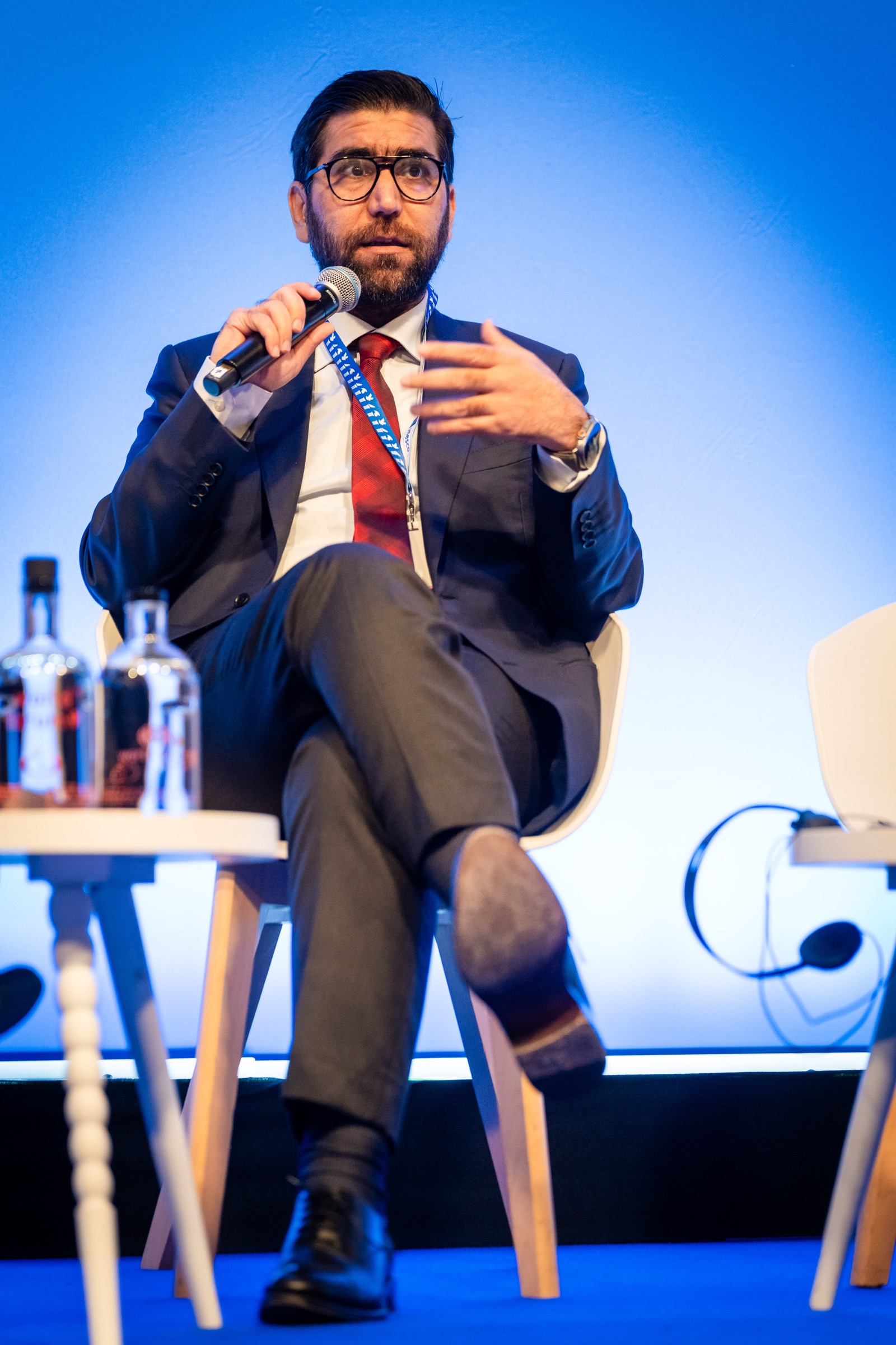 Omar Mohammed speaking on stage